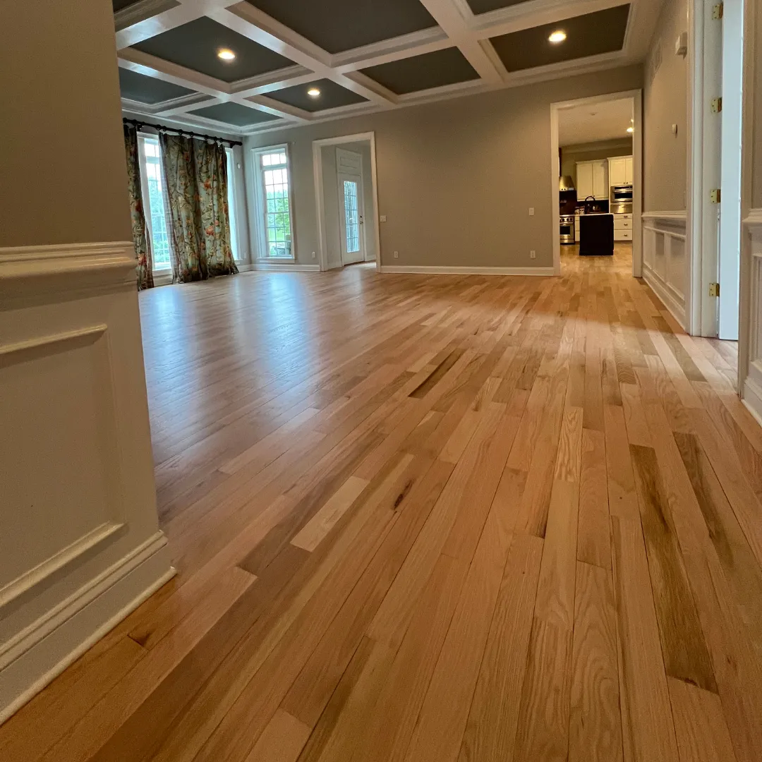 Refinished hardwood floor with a smooth, modern look and clean tone