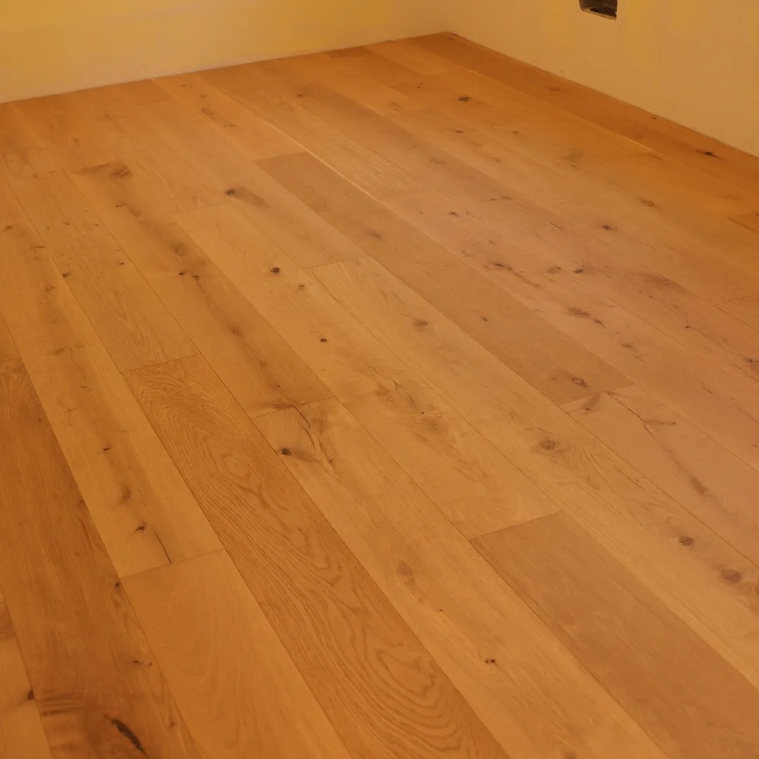 Hardwood floor surface with a clean consistent look after professional sanding and finishing