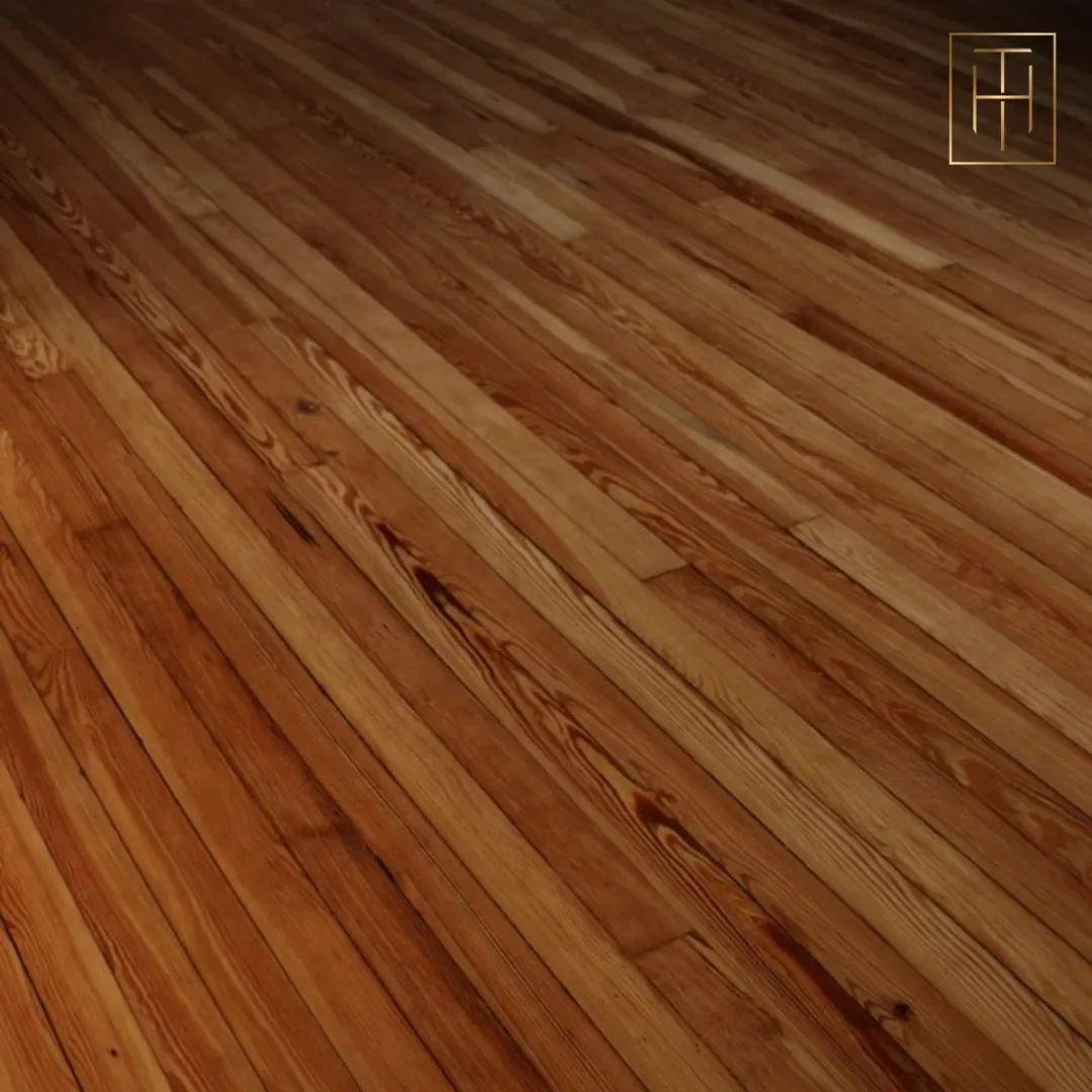 Refinished pine hardwood floor close-up showing wood grain detail in West Chester PA historic home