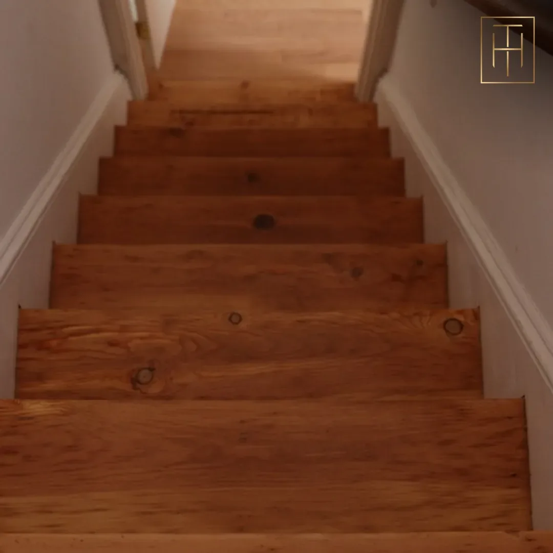 Refinished Pine Hardwood Stairs Pine hardwood stairs refinished with knotted natural wood detail in Doylestown PA home interior