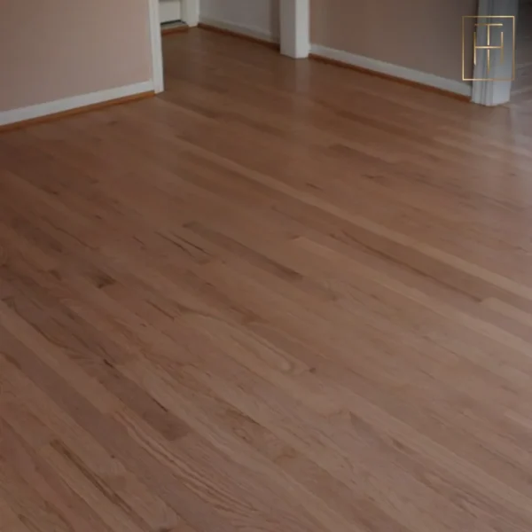 Newly installed red oak hardwood floor in Wayne PA open living room with neutral walls