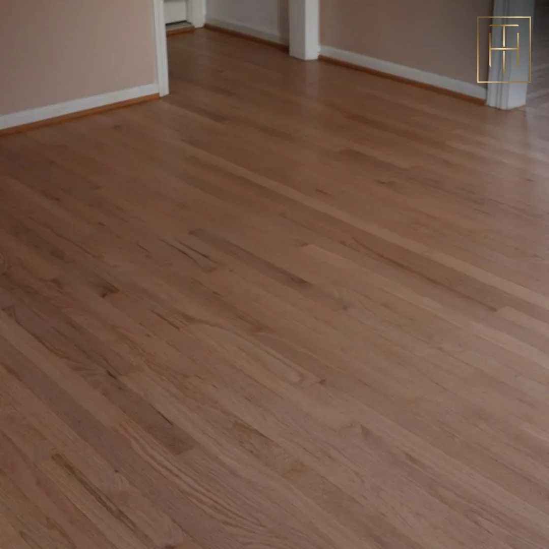 Newly installed red oak hardwood floor in Wayne PA open living room with neutral walls